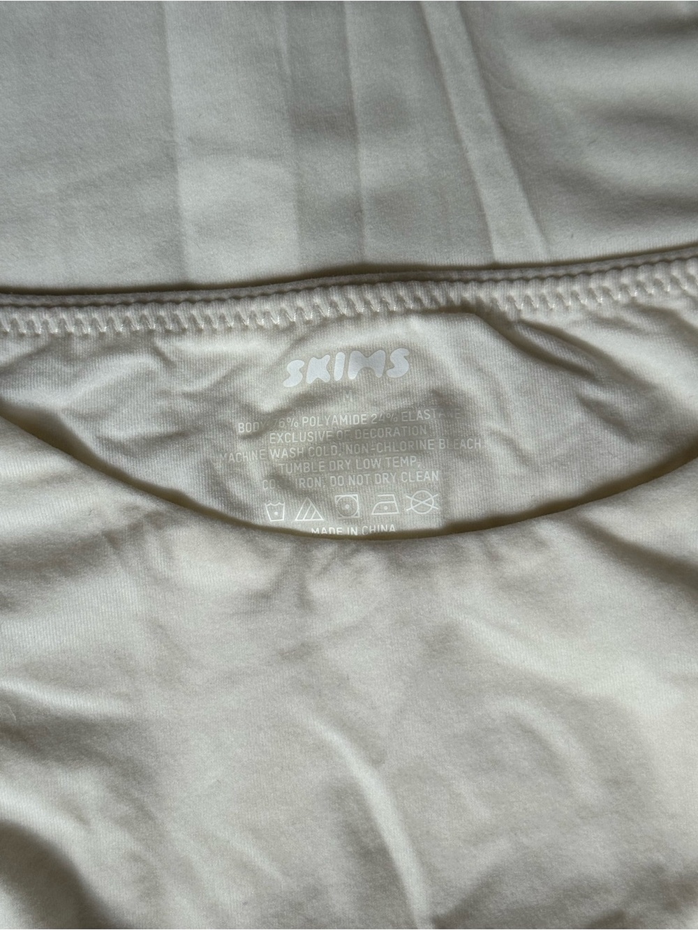 SKIMS High Neck Bodysuit in Cream/White - Picture 3 of 3